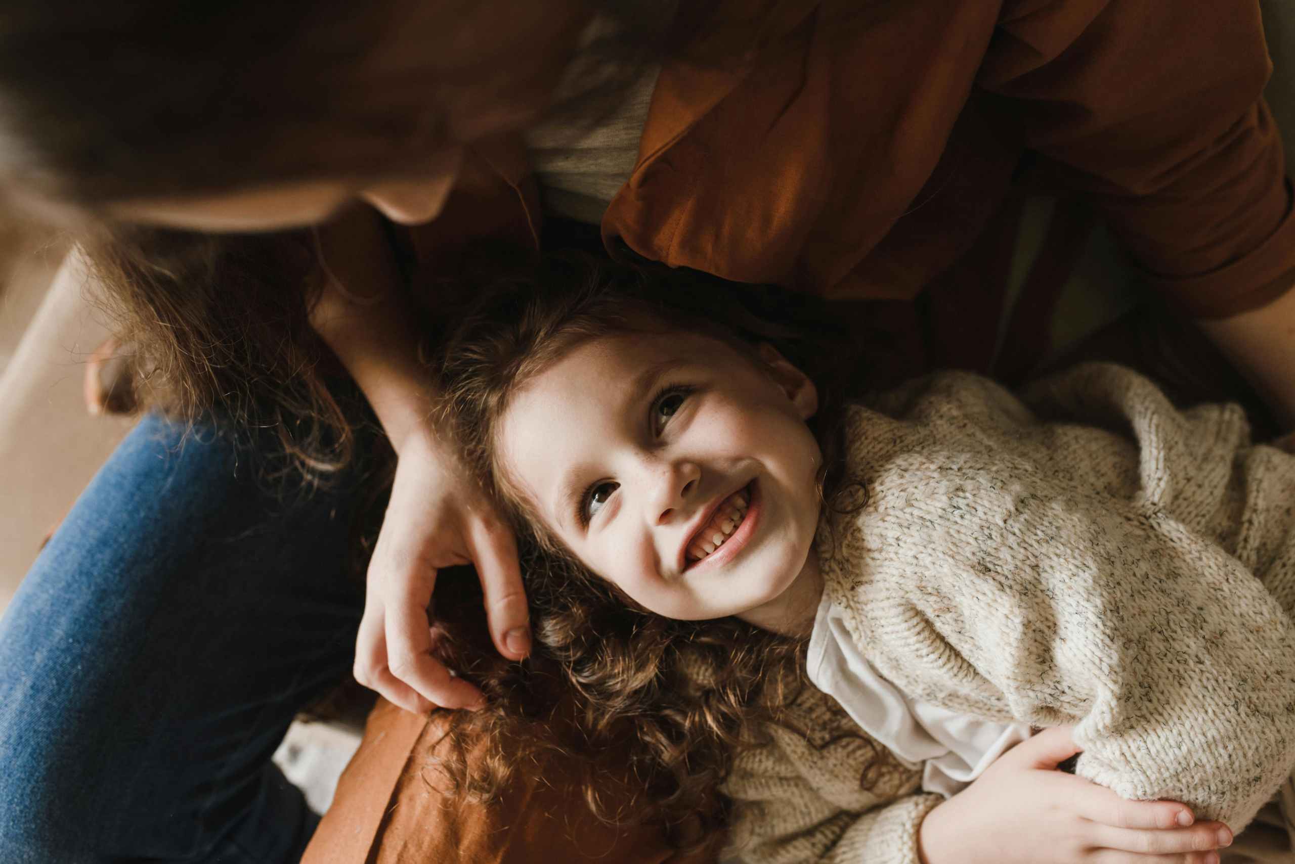 How people pleasing develops in childhood through early approval and emotional connection with caregivers